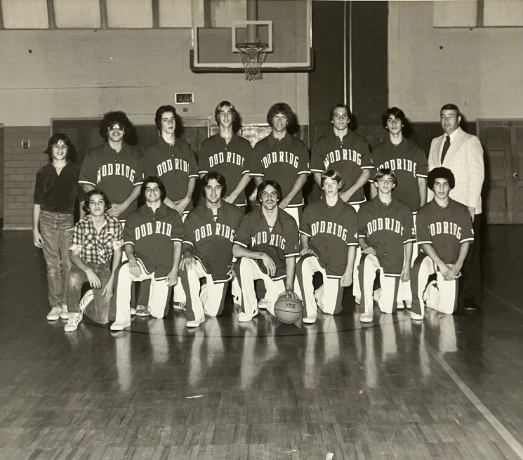 The Wood-Ridge Blue Devils in warm-ups, posed in the school gymnasium